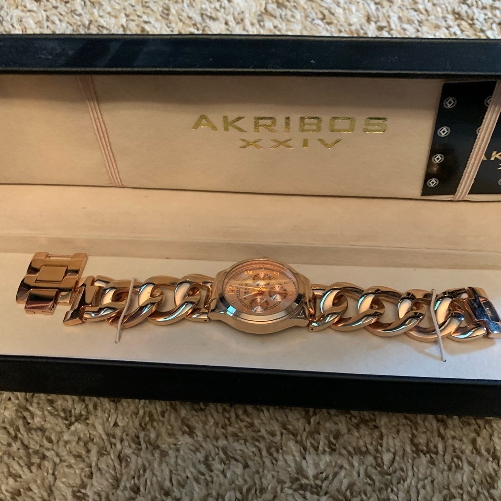 Akribos XXIV ladies rose gold watch